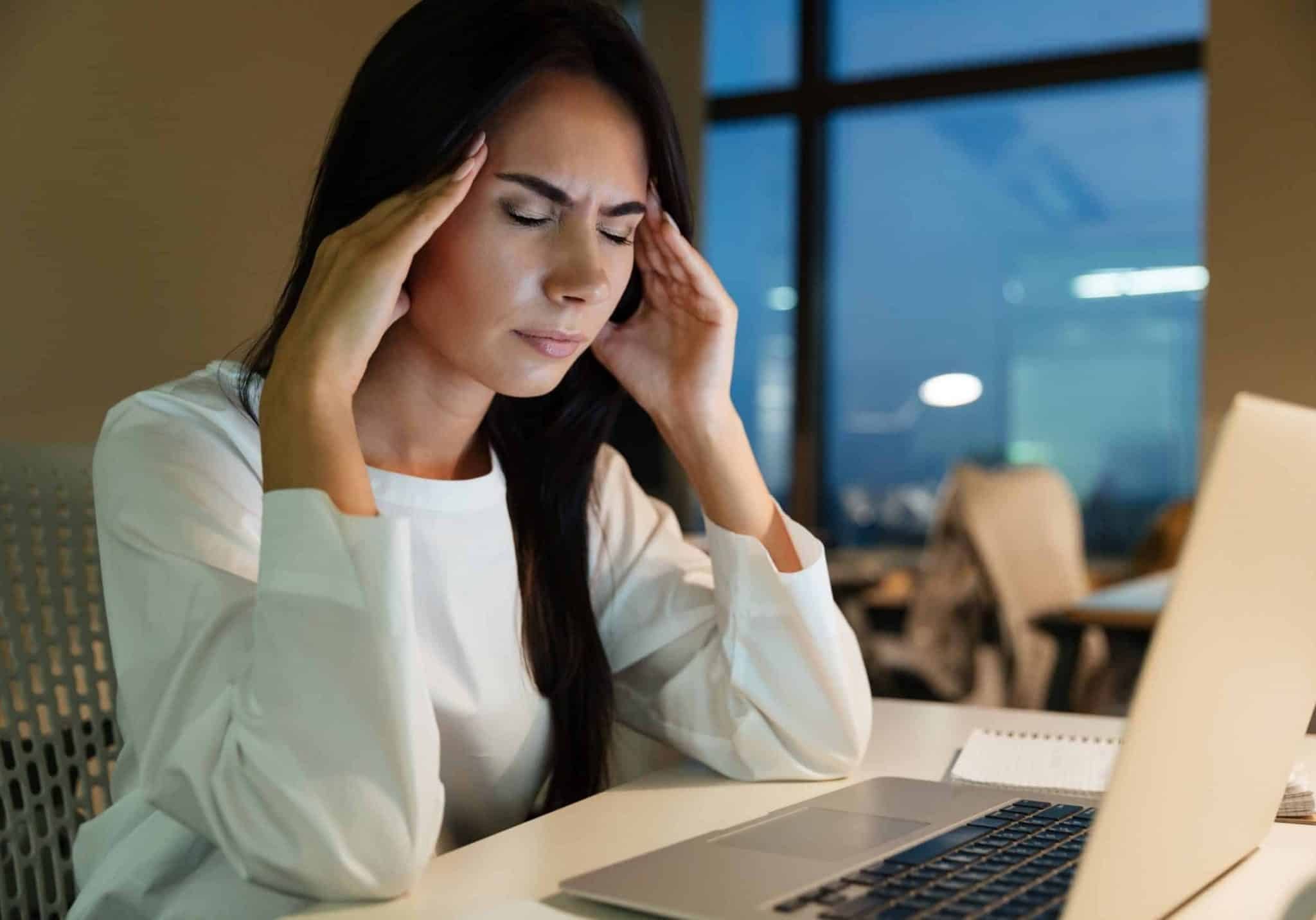 graphicstock-tired-fatigued-young-businesswoman-touching-her-temples-and-having-headache-in-office_r8KTivmdhx-scaled-landscape-5846c8b5bb8c008a830d4df4b4ec3b40-vaugk4ed3o07